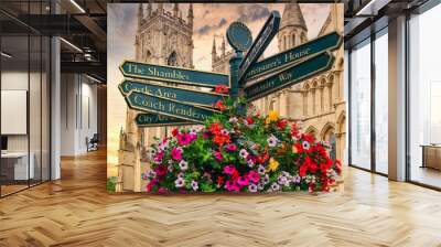 The York Minster and a sign with directions to landmarks in the city Wall mural