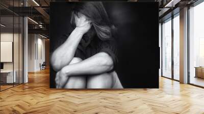 Young woman crying domestic violence Wall mural