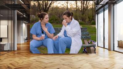 two sad nurses taking a break outside Wall mural