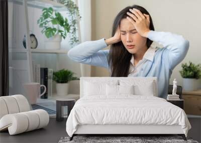 Stressed, exhausted asian young woman, girl pain from vertigo, having migraine symptoms headache, feel unhealthy, suffering from dizziness, holding head with hand. Health care problem of people. Wall mural