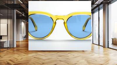 A yellow framed sunglasses isolated on white background, a stylish eye accessory for sun protection Wall mural