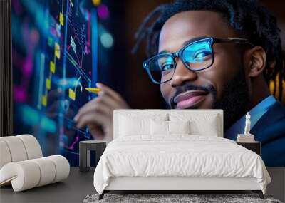 Data-Driven Success: A confident and focused businessman with dreadlocks and glasses analyzes data on a digital screen. Wall mural