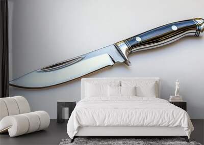 Elegant Black and Silver Hunting Knife: A sleek, sharp hunting knife with a black wood handle and a silver blade, isolated on a white background. The knife's design exudes quality and craftsmanship, m Wall mural