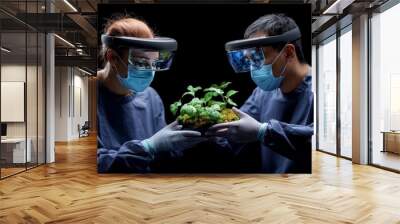 Future of Science: Two scientists, wearing protective gear and VR headsets, hold a small plant, symbolizing the potential of innovation and progress in the fields of biology and technology.  Wall mural