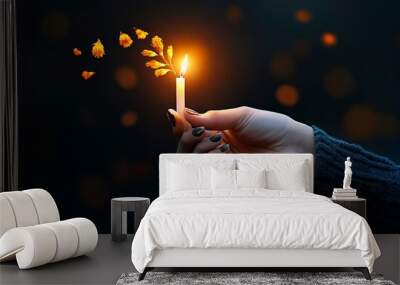 Hope's Warm Glow: A hand delicately holds a flickering candle against a dark, bokeh background, casting a soft, golden light that illuminates the hope and resilience of the human spirit.   Wall mural