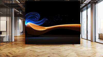 Mystical Wooden Spoon:  A handcrafted wooden spoon glows with ethereal blue energy, sparking imagination and wonder against a dramatic black background. Wall mural