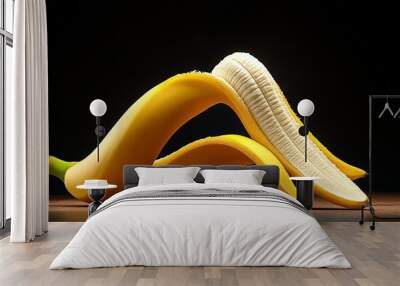 Peeled Banana on Dark Background: A single, ripe banana lies peeled on a dark background, its yellow skin contrasting with the black backdrop. The banana is partially peeled. Wall mural