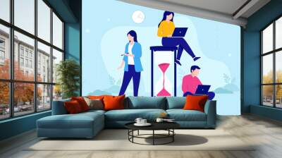 Deadline hourglass and group of effective business people working against time. Flat design vector illustration with blue background Wall mural