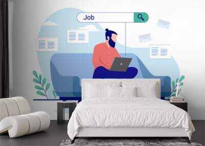 Job search - man looking for work online sitting in couch. Flat design vector illustration with white background Wall mural