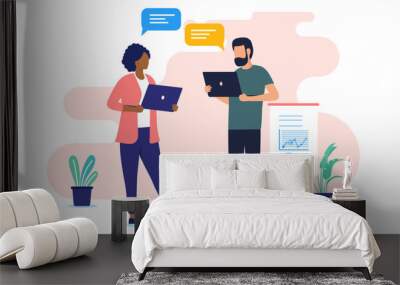 Man and woman with computers - Two people in office having a business conversation while standing, talking and discussing work together. Flat design vector illustration with white background Wall mural