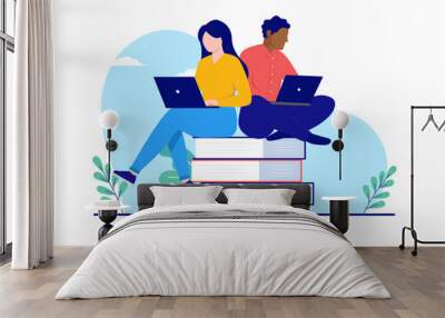 Studying and education - Man and woman students sitting on books with computer learning and taking online courses. Flat design vector illustration with white background Wall mural