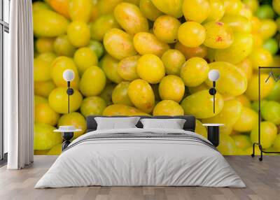 Background of ripe green grapes on a fresh market stall Wall mural