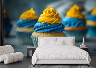 Festive cupcakes decorated with blue and yellow frosting for Ukrainian holiday Wall mural