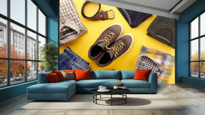 Mens casual clothing outfits and accessories flat lay on yellow background, top view Wall mural