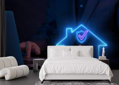 Businessman working with computer laptop and showing animation of neon line house with shield guard with fire icon. Protection and home and fire insurance concept. Wall mural