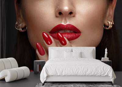 Beautiful girl with a classic make-up and red nails. Manicure design. Beauty face. Wall mural