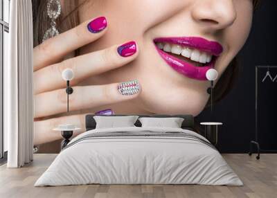 girl with a bright make-up and manicure with rhinestones.  Wall mural