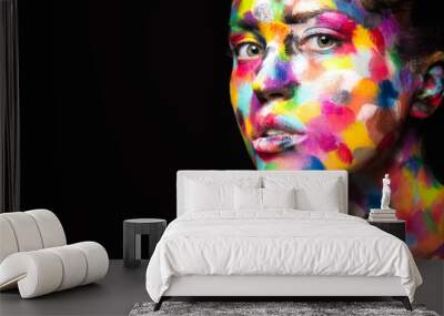 girl with colored face painted. art beauty image. Wall mural