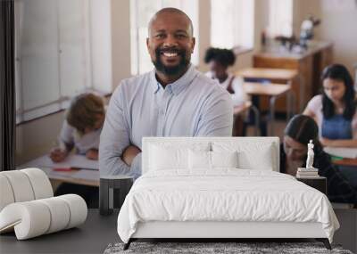 Welcome to our world of learning. Portrait of mature man teaching a class of teenage students. Wall mural