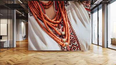 Ukrainian woman in embroidery vyshyvanka dress and ancient coral beads. Traditional antique jewelry necklace and costume of Ukraine. Wall mural