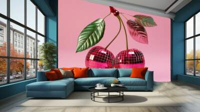 Two cherries with stems and leaves resembling disco mirror balls on a vibrant pink background, a shiny and playful image Wall mural