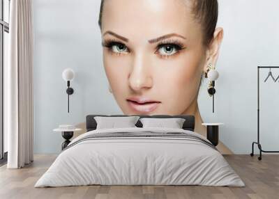  woman with beauty face and clean face skin , glamour makeup Wall mural