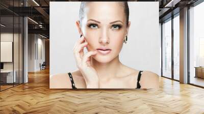 woman with beauty face and clean face skin , glamour makeup Wall mural