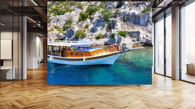 Traditional boat in ruins of the ancient city on the Kekova isla Wall mural