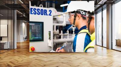 Mechanical inspector and training recording to operation monitor of compressor in the plant for production process, routine daily record. Wall mural