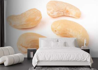 few cashew nuts on a white background close-up Wall mural