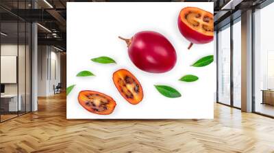 Fresh tamarillo fruit with leaves isolated on white background. Top view. Flat lay Wall mural