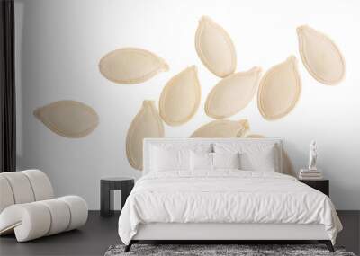 Heap of pumpkin seeds isolated on white background. Top view. Flat lay Wall mural