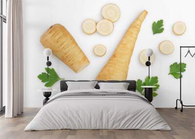 Parsnip root and slices with parsley peppercorns isolated on white background closeup. Top view. Flat lay Wall mural