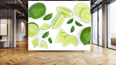 sliced lime with leaves isolated on white background. Top view. Flat lay pattern Wall mural