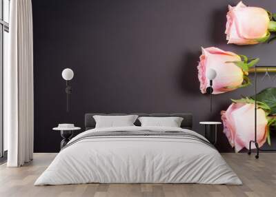 three beige rose on dark background with copy space for your text. top view Wall mural