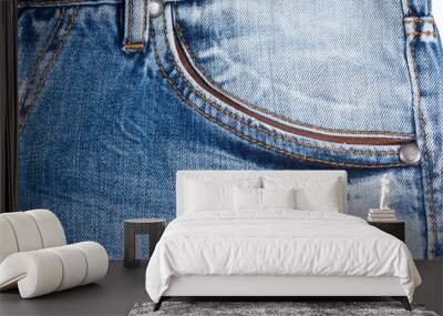 close up of faded blue jeans pocket Wall mural