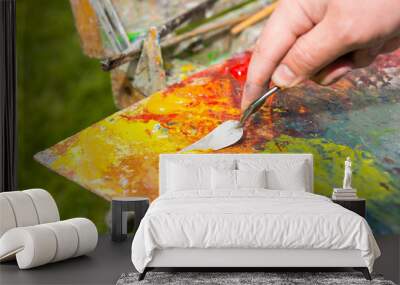 Painter Mixing Colors By Palette Knif Wall mural