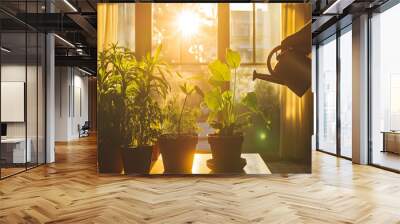 A person watering houseplants near a sunlit window as rays of golden light create a calm, cozy atmosphere in a modern living room Wall mural