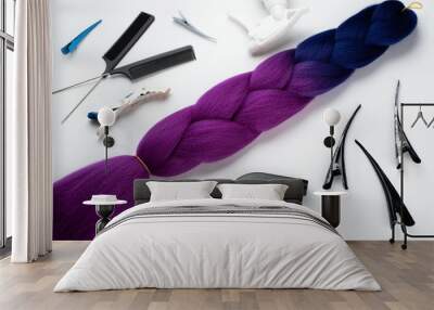 Kanekalon two- color-artificial hair purple and blue for braiding braids, lying on a white background next to accessories for braiding braids Wall mural