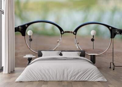 glasses on a wooden table Wall mural