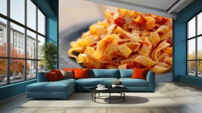 Tagliatelle with tomato sauce in wooden plate Wall mural