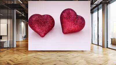 two hearts shape on the plain background Wall mural