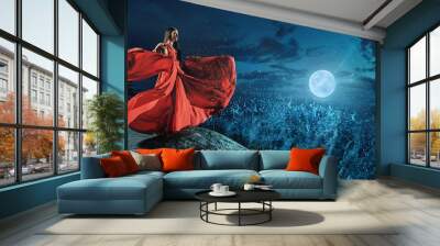 Beautiful lady looking at the storm on the occean Wall mural