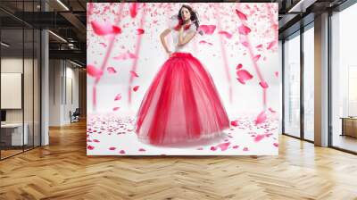 Beauty brunette wearing fashionable dress Wall mural