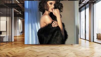 Beauty woman wearing fur Wall mural