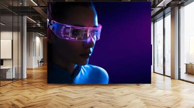 Concept of future technology or entertainment system, virtual reality. Female portrait lit by HUD interface Wall mural