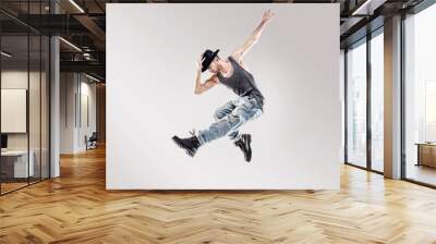 Fashion shot of a young hip hop dancer Wall mural