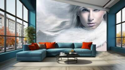 Fine art portrait of a beautiful lady in fur Wall mural