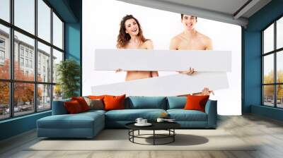 laughing nude couple with empty adverts Wall mural