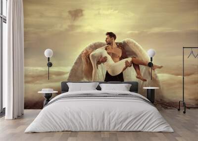 Portrait of an archangel carrying a beautiful innocent woman Wall mural